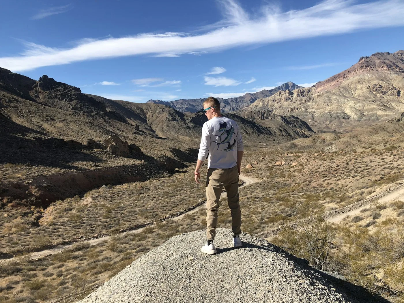 Desert trail in Palm Springs with rocky terrain and views over the Coachella Valley at sunrise