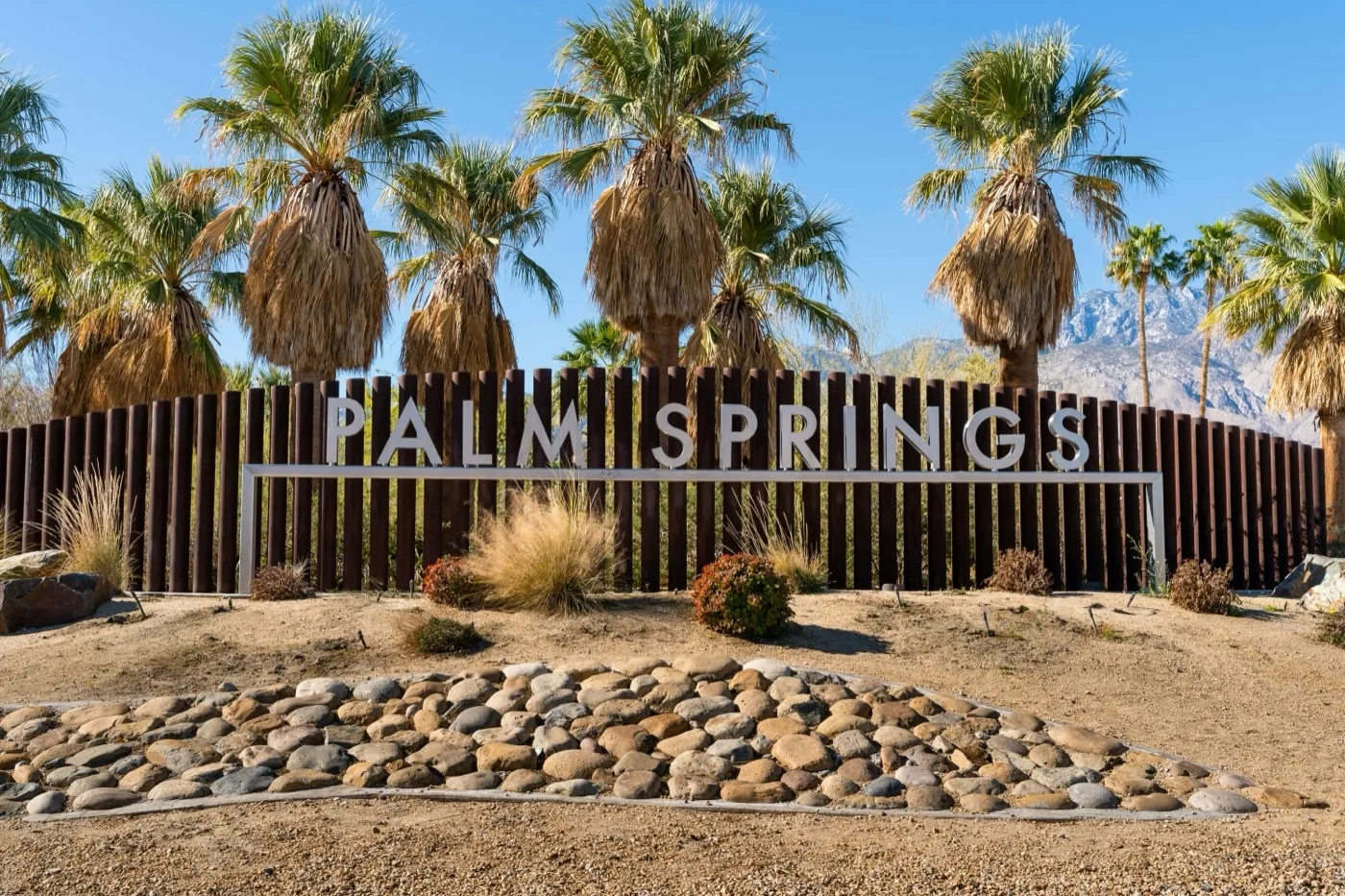 Welcome to Palm Springs roadside sign with desert landscape