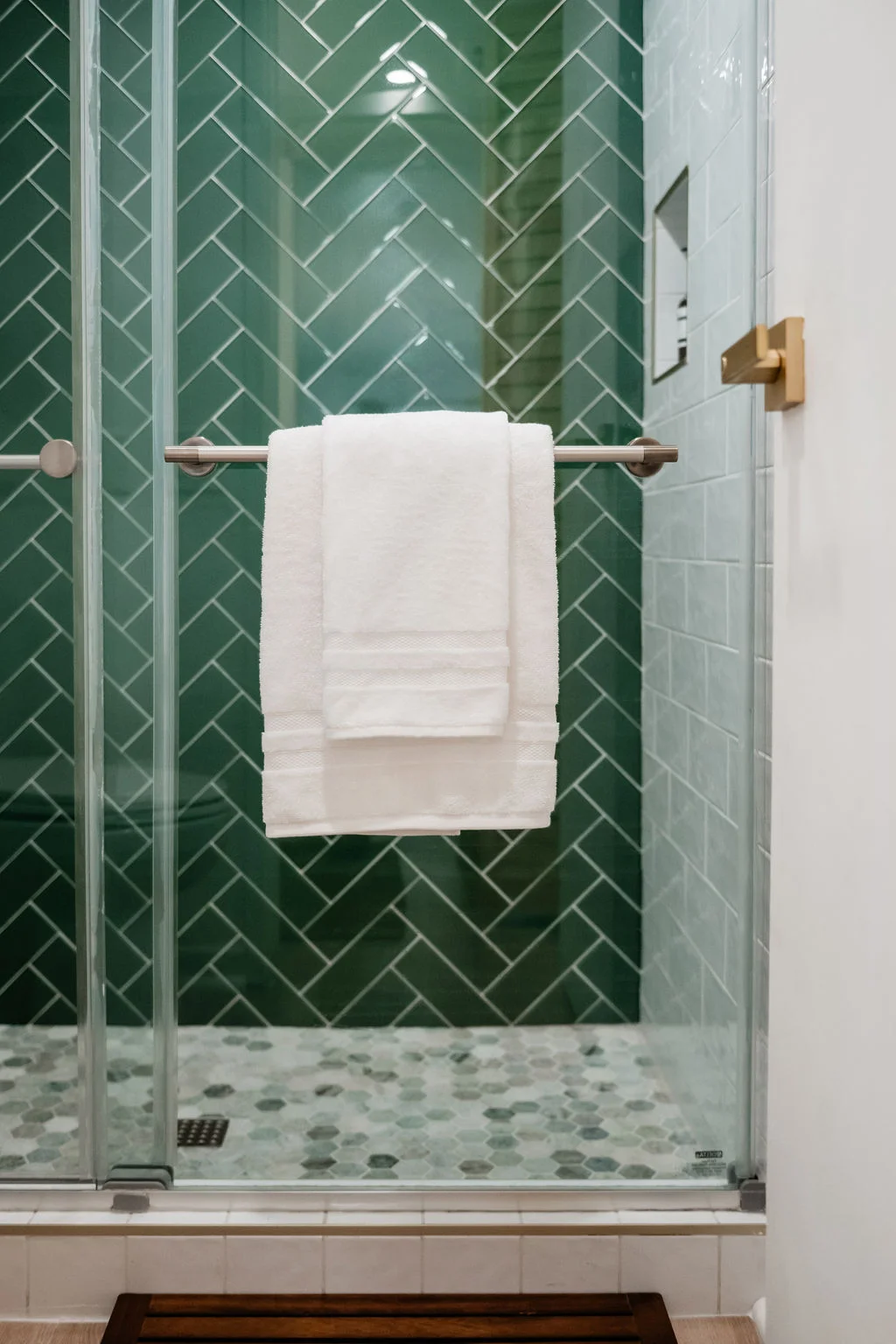 The Sundune Palm Springs second bathroom emerald green herringbone tile walk-in shower detail